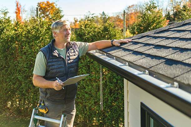 Professional Hail Damage Roof Repair technician working in Boulder, UT